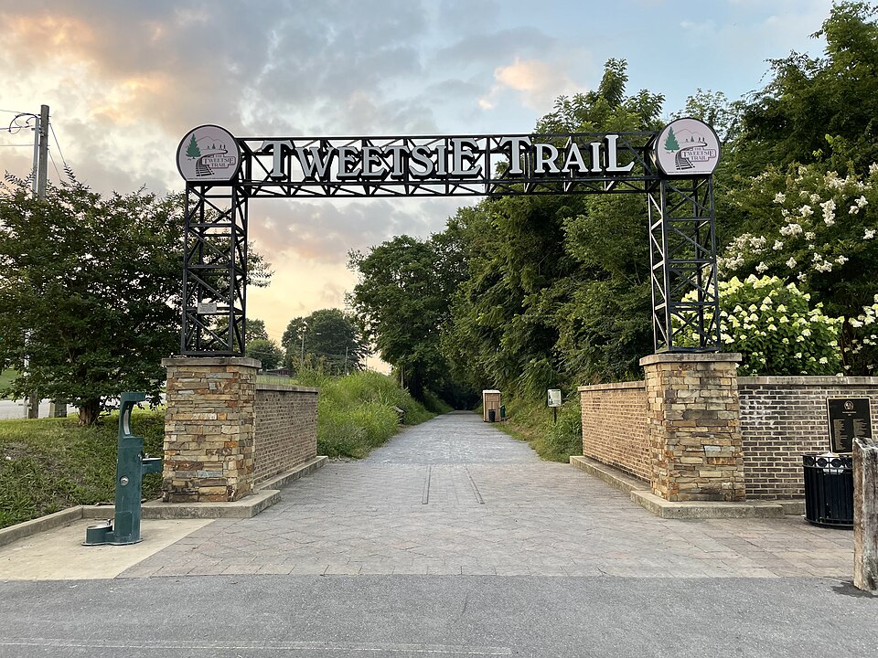The Tweetsie Trail entrance arch and reconstructed narrow-gauge track in Johnson City